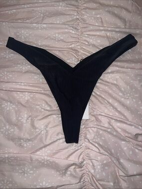 Black Ribbed thong bikini bottom.